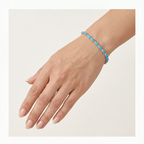 Opal tennis bracelet with cubic zirconia
