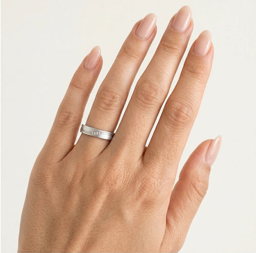 White gold wedding ring with curved matte line