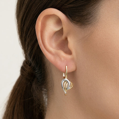 Zlaté náušnice s abstraktními liniemi