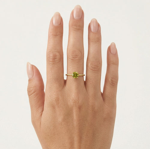 Stylish round cut modavite gold ring