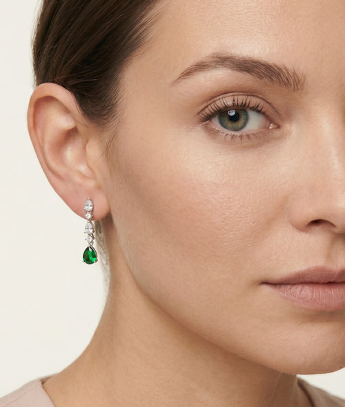 Silver earrings with synthetic emerald and cubic zirconia accents