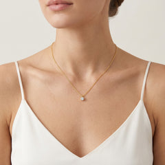 Delicate gold solitaire necklace with zircon