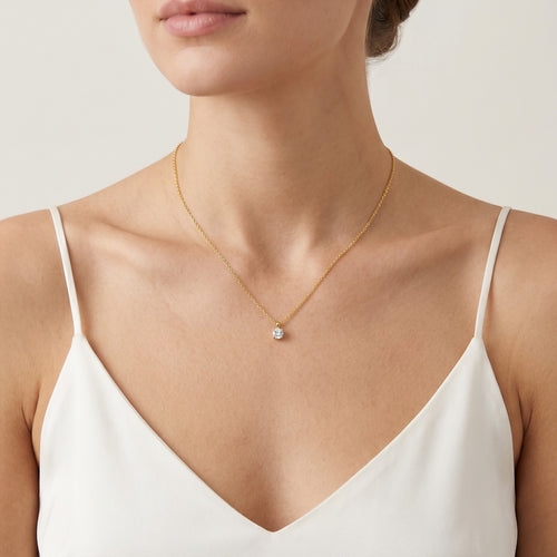 Delicate gold solitaire necklace with zircon