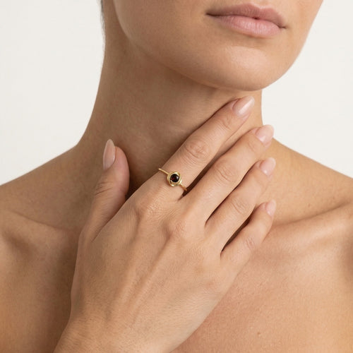 Graceful garnet round fine step cut women ring