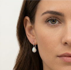 White opal drop earrings with royal cubic zirconia