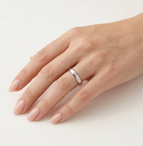 White gold wedding ring with falling edges