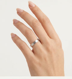 White gold wedding ring with high polished lines