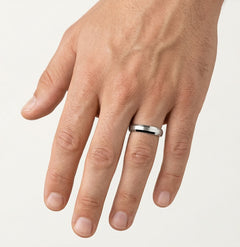 White gold wedding ring with stones on edges