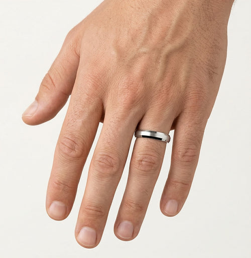 White gold wedding ring with stones on edges