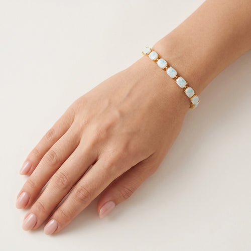 Pulsera de oro amarillo con ópalo blanco rectangular