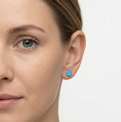 Zlaté puzetové náušnice s modrým opálem