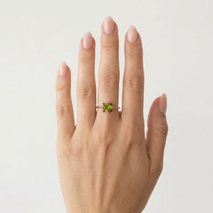 Elegant moldavite and garnet ring