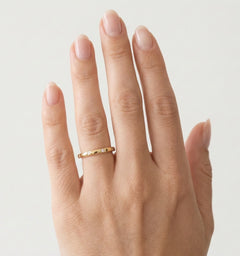 Thin yellow gold ring and zircons