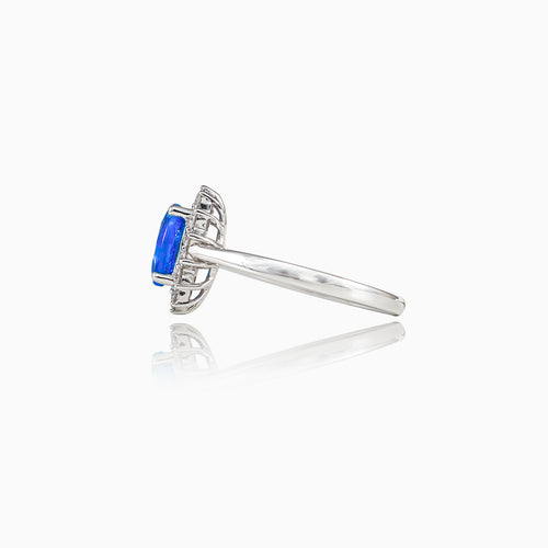 Obdelníkový halo prsten s tanzanitem a diamanty
