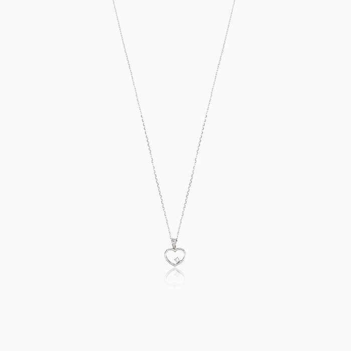 Cœur en or avec un diamant à l'intérieur