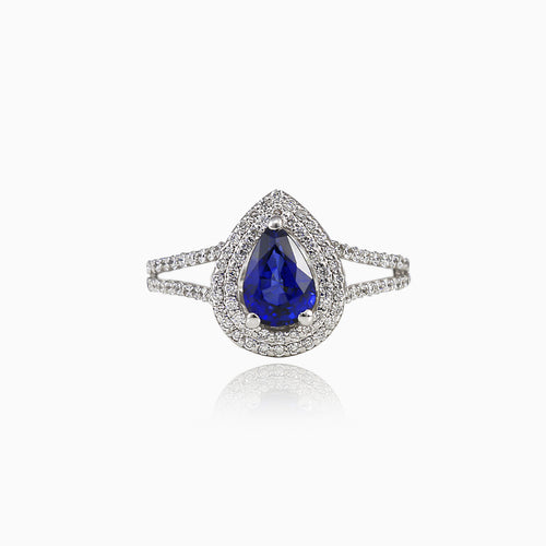 Pear sapphire ring with diamond setting