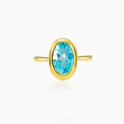 Gold ring with topaz