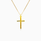 Gold cross with a pattern