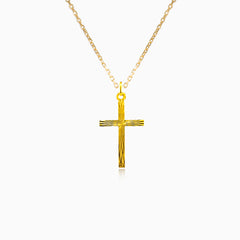 Gold cross with a pattern