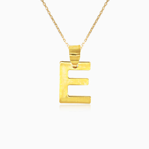 Gold pendant of letter "E"