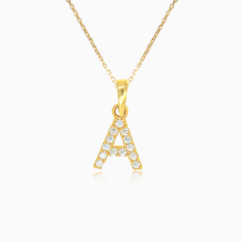 Gold pendant of letter "A" with zircons