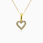 Small gold heart with shiny cubic zirconia stones