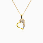 Gold heart with cubic zirconia on one side