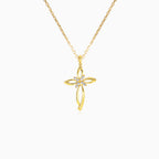 Small gold detailed cross with zircons