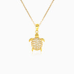 Gold turtle pendant with zircons