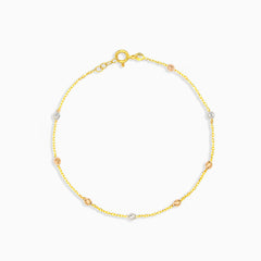 Simple gold bracelet with marbles