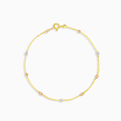 Simple gold bracelet with marbles