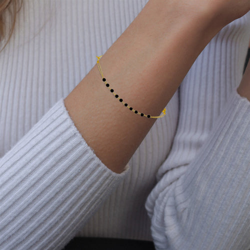 Gold rosary bracelet with onyx