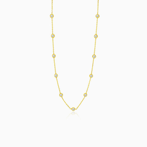 Gold necklace with multiple round zircons