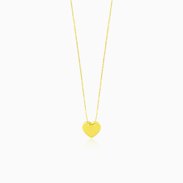 Gold necklace with a delicate heart