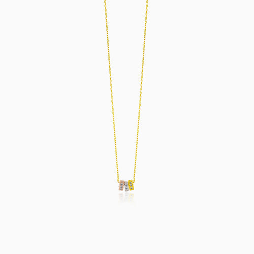 Gold necklace with triple gold rings