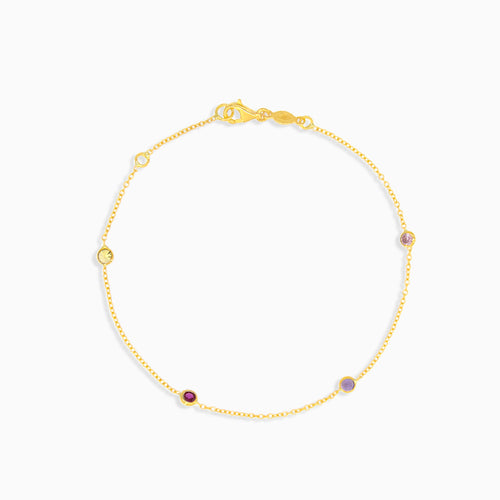 Gold chain bracelet with colored stones
