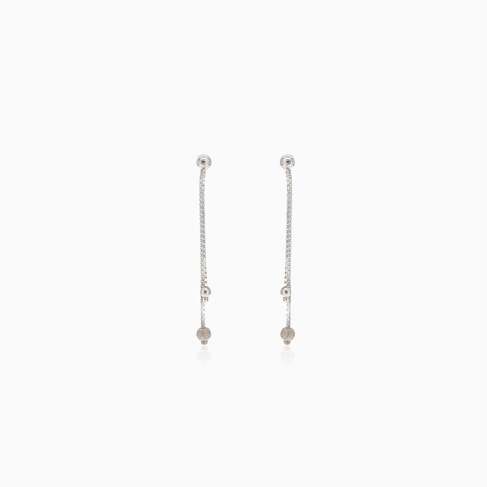 White gold earrings with a hanging balls