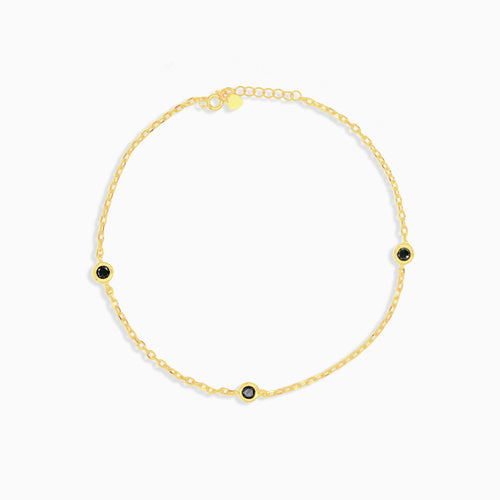 Gold plated bracelet with three onyx stones