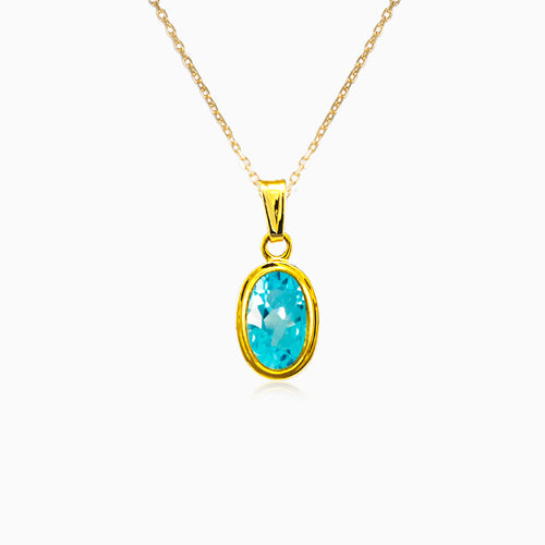 Gold pendant with oval Topaz