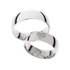 Massive white gold wedding ring with heart