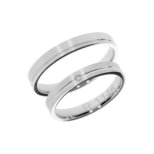 Solitaire white gold wedding ring with flat polished line