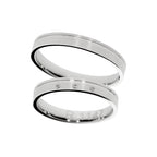 White gold wedding ring with flat polished line and stones