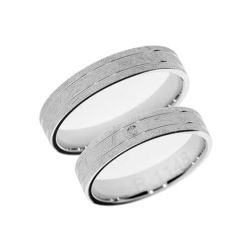 Solitaire white gold wedding ring with matte finish