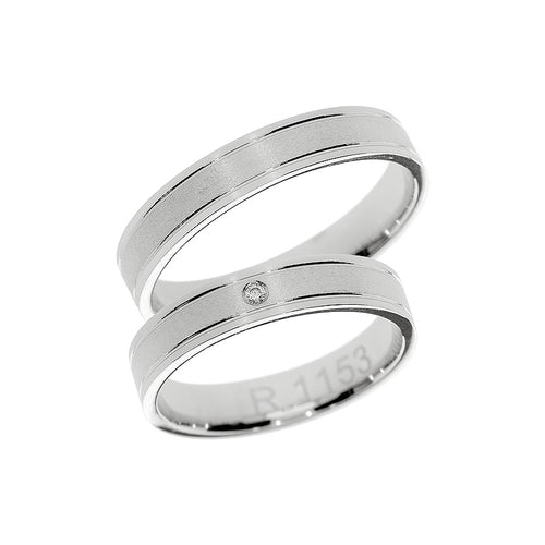 Solitaire white gold wedding ring with matte center