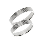 White gold wedding ring with high polished lines