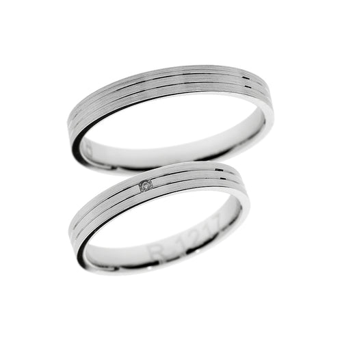 White gold solitaire wedding ring with lines