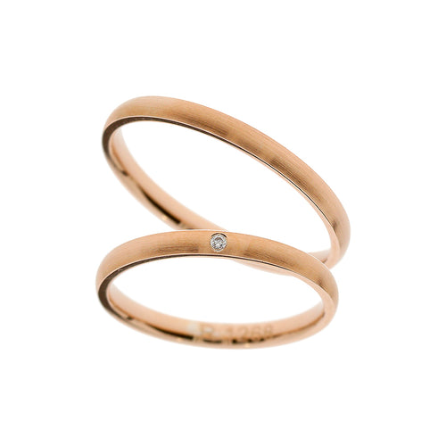 Matte finish rose gold wedding ring with round cut stone