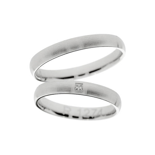 Matte finish white gold wedding ring with princess cut stone