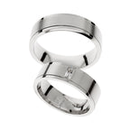 White gold wedding ring with solitaire baguette cut stone