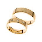 Yellow gold wedding rings with step sides